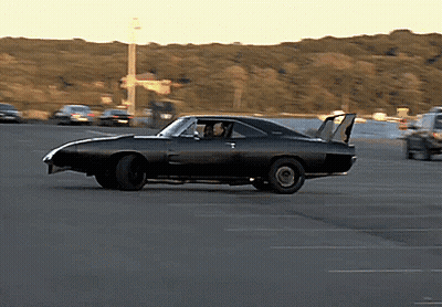 Black Car With Spoiler Driving GIF