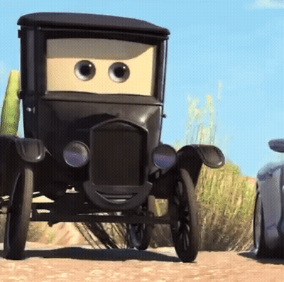 Black Cartoon Car With Big Eyes Driving Down Dirt Road GIF