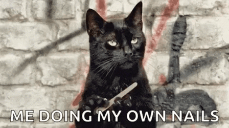 Black Cat Doing Own Nail File  GIF