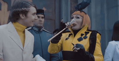 Black Cat With Yellow Eyes Sitting Next To Candle Saying Not This Time GIF