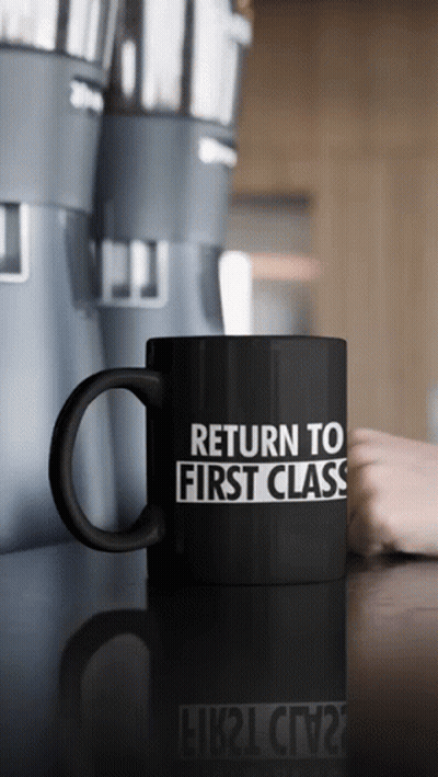 Black Coffee Mug Says Return To First Class GIF