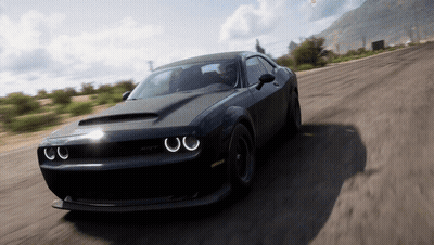 Black Dodge Challenger Driving Down Road GIF