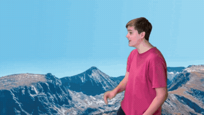 Black Dumbbell On Pile Of Rocks In Desert GIF