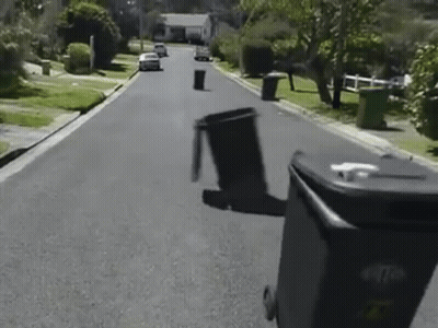 Black Garbage Can With Letter T GIF