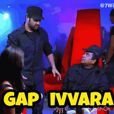 Black Hat Man Talking Red Chair Gap Ivvara GIF