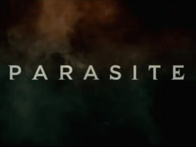 Black Jacket Man Telling Woman I Have A Parasite GIF