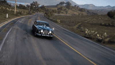 Black Jaguar Driving Beside White Van GIF