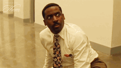 Black Man Looking Away Covering Eyes GIF