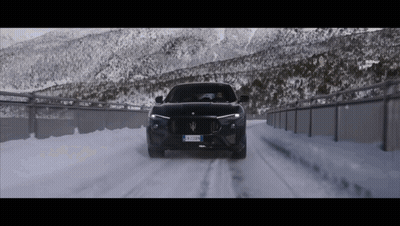 Black Maserati Driving On Snowy Road With BX JZWN Plate GIF