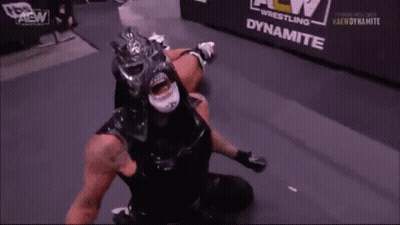 Black Masked Wrestler Open Mouth In Ring GIF