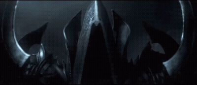 Black Object In Dark With Light Shining GIF