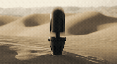 Black Object In Sandy Desert GIF