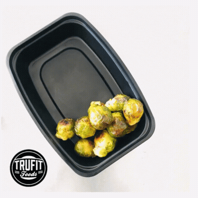 Black Plastic Container Of Brussels Sprouts With Trufit Foods Logo GIF