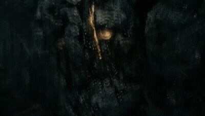 Black Rock With Gold Object GIF