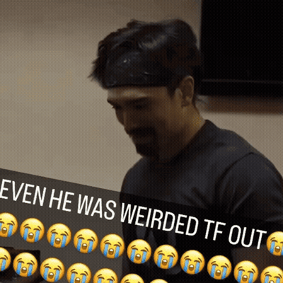Black Shirt Man Eating Food With Tongue Out GIF
