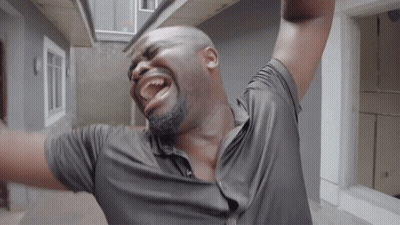 Black Shirt Man Laughing Arms Outstretched GIF