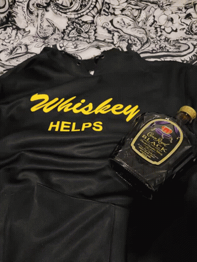 Black Shirt Says Whiskey Helps Next To Bottle GIF
