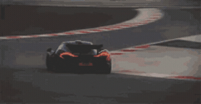 Black Sports Car On Curvy Track GIF