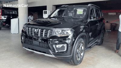 Black SUV With Namaste Car In Showroom GIF