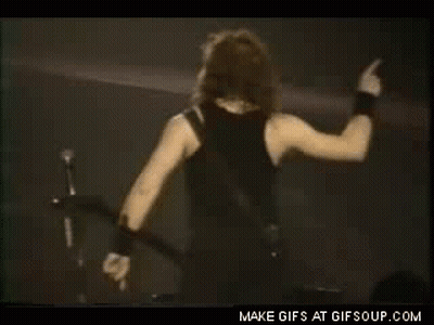 Black Tank Top Man Dancing On Stage Holding Guitar GIF