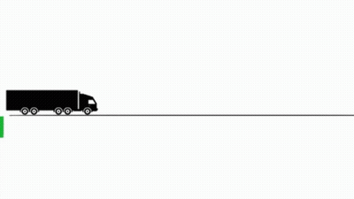 Black Truck Driving Past Green Go Green Sign