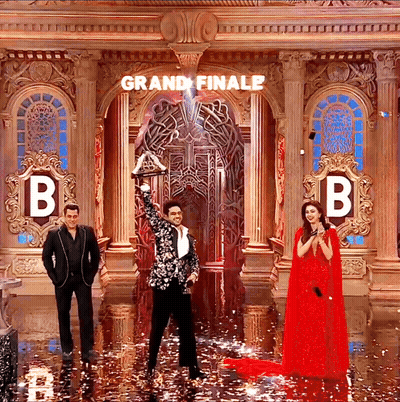 Black White Suit Man Holds Trophy Grand Finale GIF