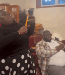 Black Woman Ringing Cowbell GIF