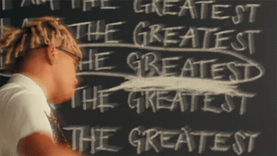 Blackboard Saying The Greatest In White Chalk GIF