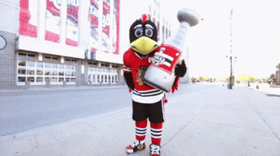 Blackhawks Mascot Holding Large Trophy GIF