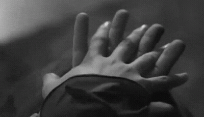 Blindfolded Person Holding Another's Hand GIF