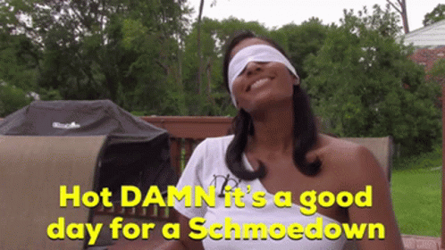 Blindfolded Woman Saying Hot Damn GIF