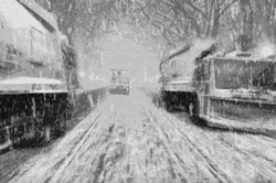 Blizzard Heavy Trucks Travelling Icy Road GIF