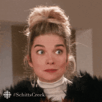 Blond Girl Winking Eyes GIF
