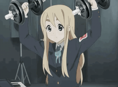 Blonde Anime Girl Lifting Dumbbells In Front Of Keyboard GIF
