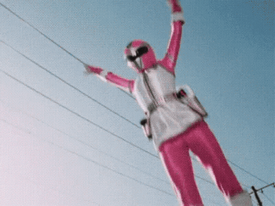 Blonde Anime Girl Lifting Dumbbells In Front Of Keyboard GIF