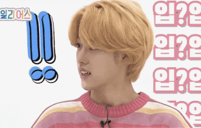 Blonde Boy In Pink And White Striped Sweater With Question Mark GIF