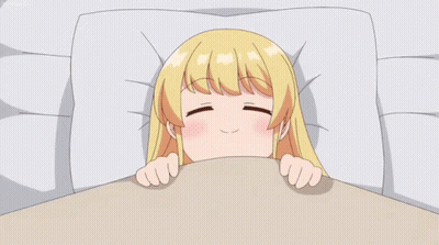 Blonde Cartoon Girl Laying In Bed With Mouth Open GIF