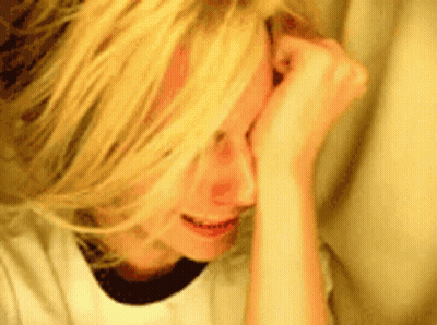 Blonde Girl Crying With Hands On Face GIF