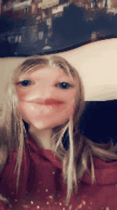 Blonde Girl In Red Hoodie Making Funny Face GIF