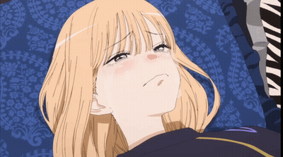 Blonde Girl Laying On Blue Blanket GIF