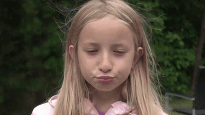 Blonde Girl Making Funny Face GIF