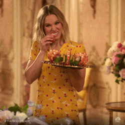 Blonde Girl Takes A Bite GIF
