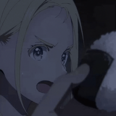 Blonde Girl With Blue Eyes Holding Rice Ball GIF