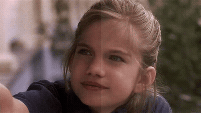 Blonde Girl With Blue Eyes Looking Up GIF