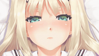 Blonde Girl With Green Eyes Lying On Bed GIF