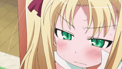 Blonde Girl With Green Eyes Making A Face GIF