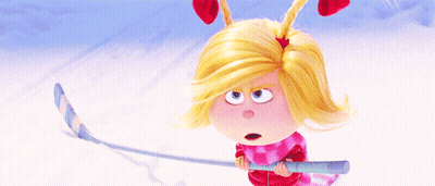 Blonde Girl With Red Ears Skiing Down Snowy Slope GIF