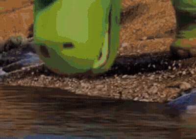 Blonde Girl With Red Eyes Looking At Camera GIF