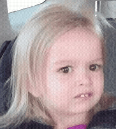 Blonde Little Girl Making Funny Face In Car Seat GIF