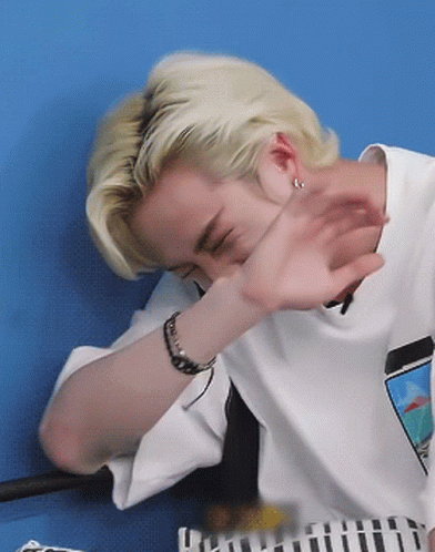 Blonde Man Covering Face GIF
